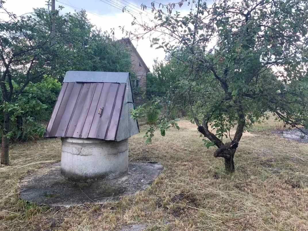 Дачний будинок з ділянкою 12 сот
