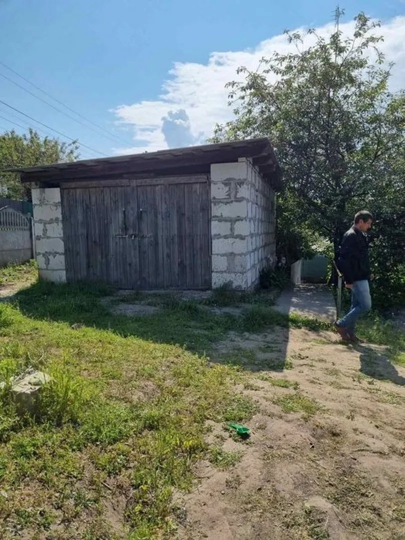 Продам полдома в центре Василькова