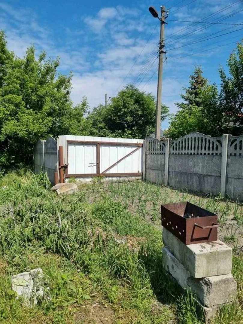 Продам полдома в центре Василькова