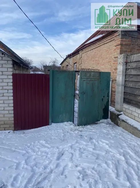 Продаж півбудинку на Новомиколаївці